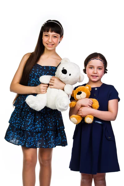 Dvě dívky s hračkami — Stock fotografie
