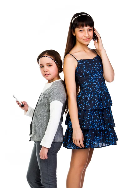 Two girls talking on the phone — Stock Photo, Image