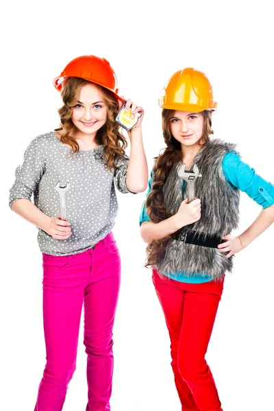 Dos chicas en cascos de construcción —  Fotos de Stock