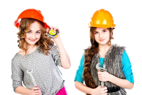Dos chicas en cascos de construcción —  Fotos de Stock