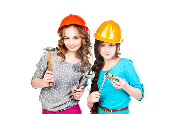 Deux filles dans les casques de construction — Photo