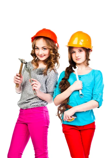 Two girls in construction helmets — Stock Photo, Image