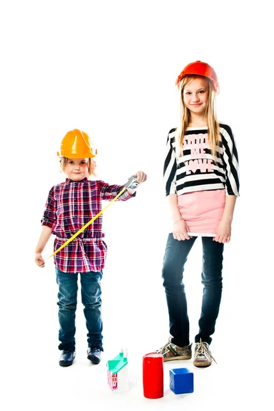 Dos chicas en cascos de construcción — Foto de Stock