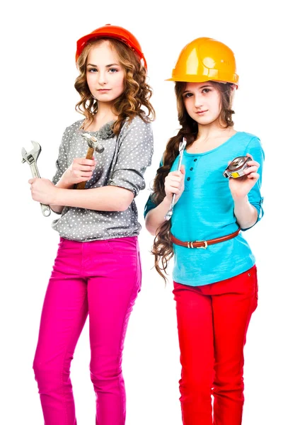 Two girls in construction helmets — Stock Photo, Image