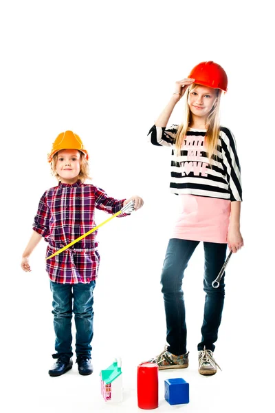 Two girls in construction helmets — Stock Photo, Image