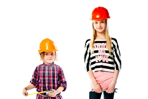 Two girls in construction helmets — Stock Photo, Image