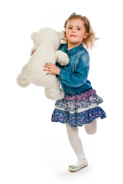 Girl with a doll — Stock Photo, Image