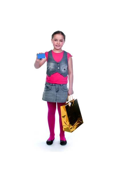 Девушка с покупками — стоковое фото