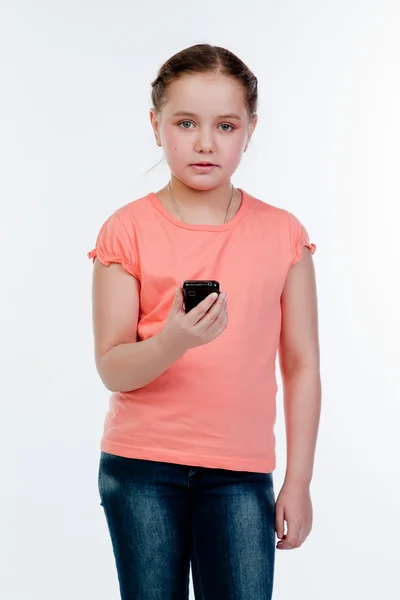 Barn med telefonen — Stockfoto