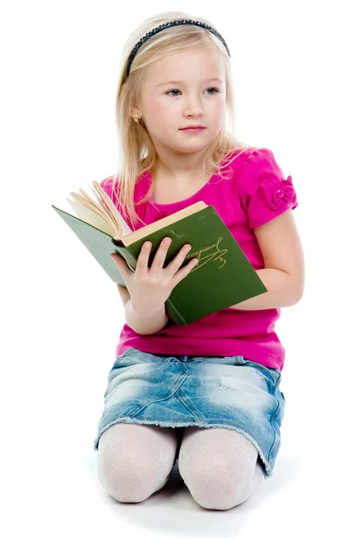 Criança com um livro — Fotografia de Stock