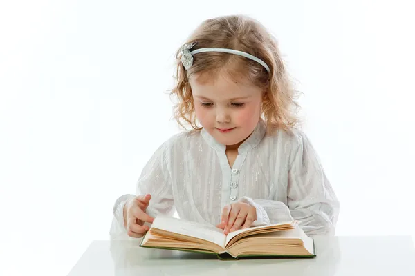 Niño con un libro —  Fotos de Stock