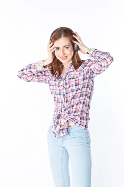 Mujer escuchando música en los auriculares —  Fotos de Stock