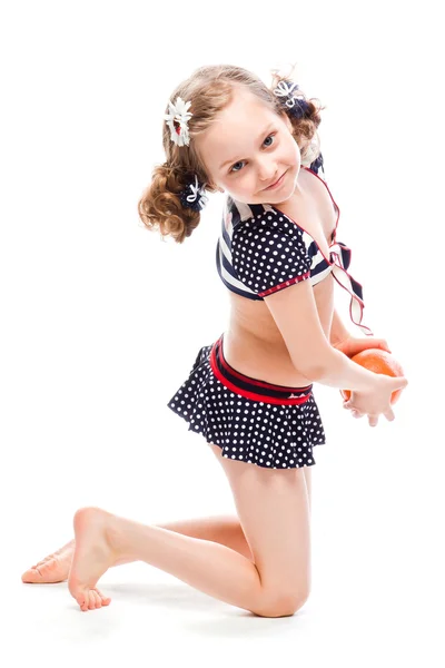 Girl with orange — Stock Photo, Image