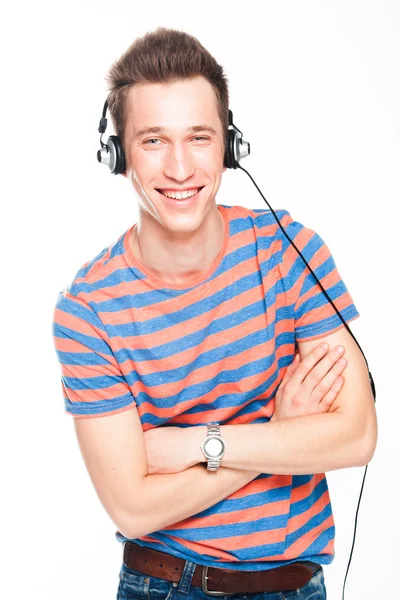 Man listens to music on headphones — Stock Photo, Image