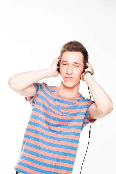 Man listens to music on headphones — Stock Photo, Image