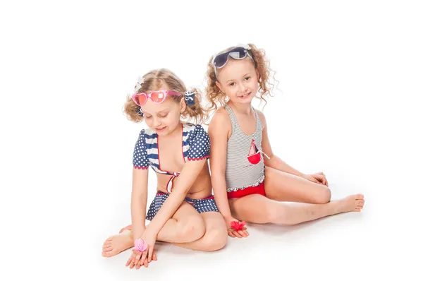 Two girls in bathing suits — Stock Photo, Image