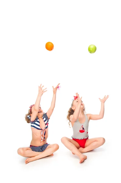 Two girls in bathing suits — Stock Photo, Image