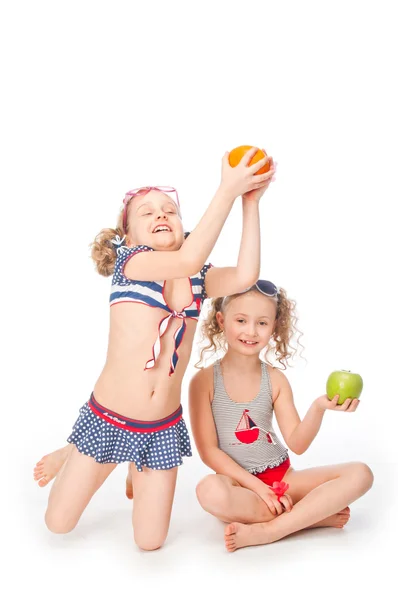 Two girls in bathing suits — Stock Photo, Image