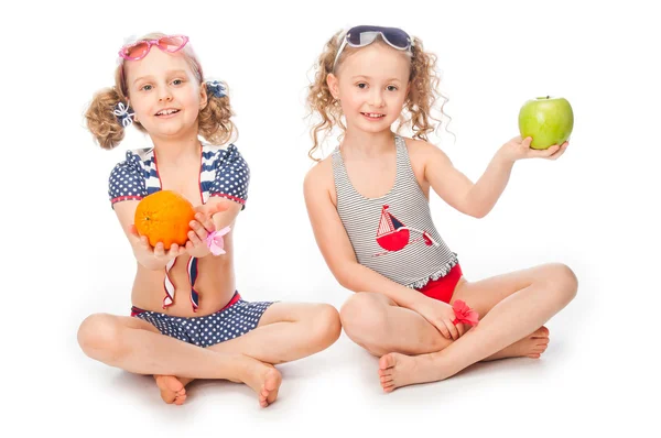 Two girls in bathing suits — Stock Photo, Image