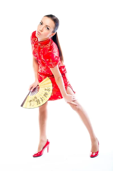 Žena v červené čínské šaty — Stock fotografie