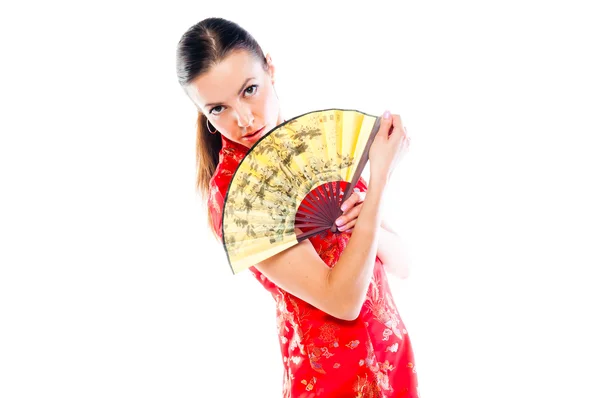 Vrouw in een rode chinese jurk — Stockfoto