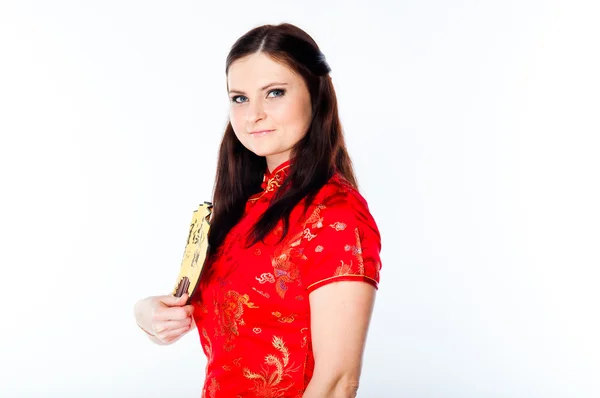 Жінка в китайське червоній сукні — стокове фото