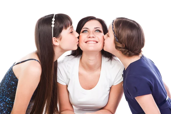Two girls kissing mom — Stock Photo, Image