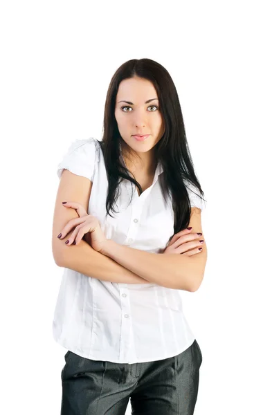 Retrato de uma jovem morena atraente em uma camisa branca — Fotografia de Stock