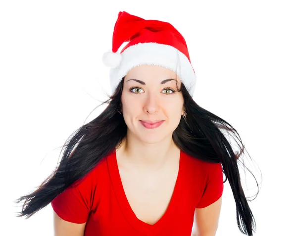 在圣诞老人的帽子，白色衬底上有吸引力的黑发女孩 — 图库照片