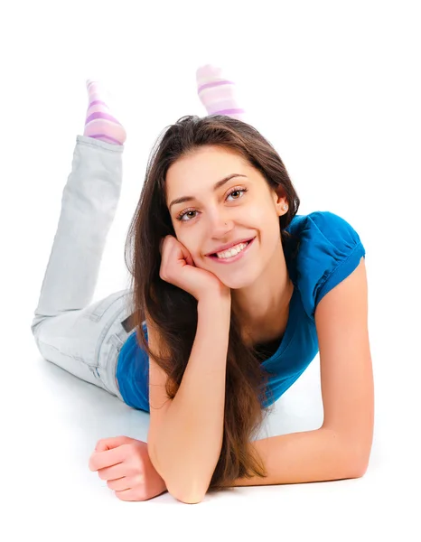 Young pretty girl lying on the floor and smiling — Stock Photo, Image