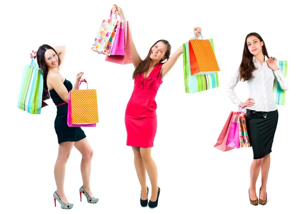 Young girls with shopping bags in hands isolated — Stock Photo, Image