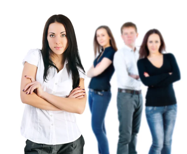 Young confident woman and group of people in the background — Stock Photo, Image