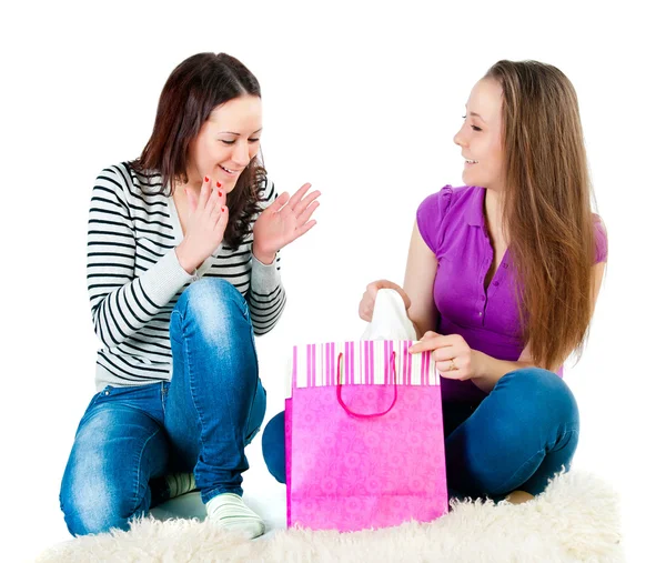 Young attractive girl sitting on the floor with delight consider — Stock Photo, Image