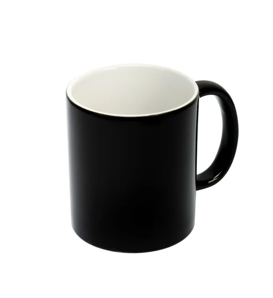 Schwarze Tasse auf weißem Hintergrund — Stockfoto