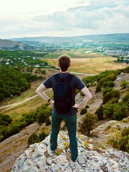 Young tourist in the mountains — Stock Photo, Image