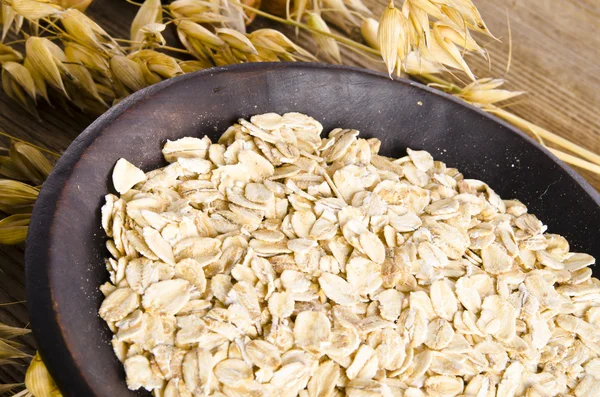 Porridge oats on bowl — Stock Photo, Image