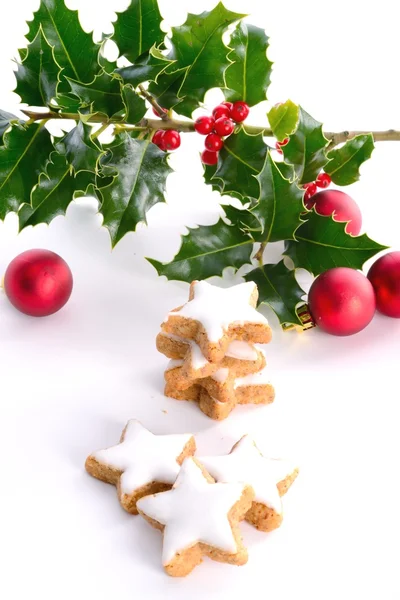 Hollies and gingerbreads — Stock Photo, Image