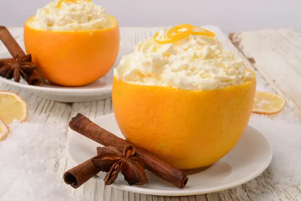 Cream - oranges - cinnamon — Stock Photo, Image