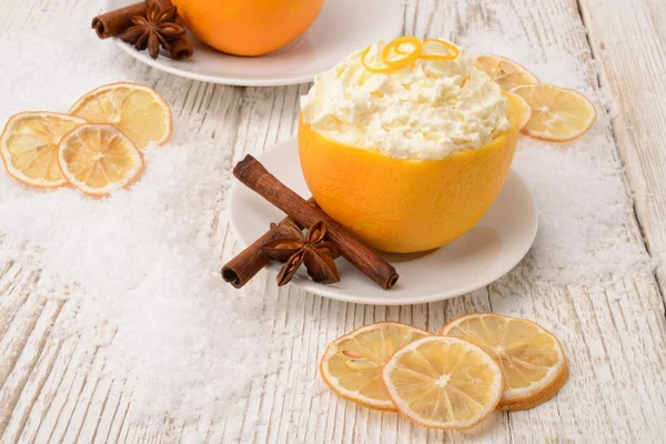 Cream - oranges - cinnamon — Stock Photo, Image