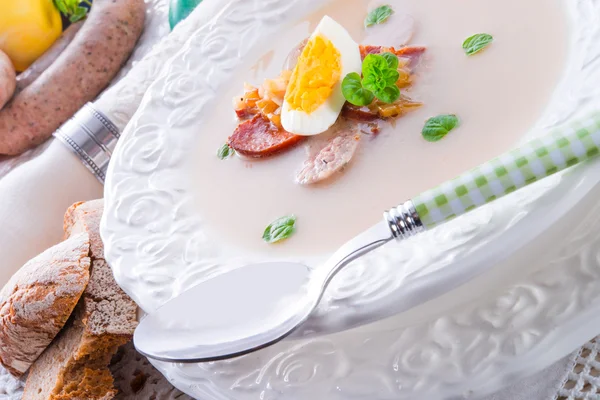 Polish Easter soup with egg and sausage — Stock Image Polish Easter soup with egg and sausage Royalty Free Stock Photos