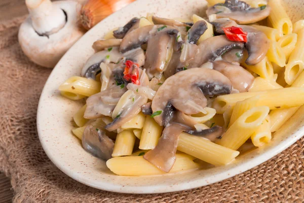 Penne and mushroom sauce — Stock Photo, Image