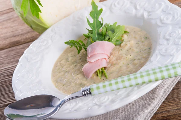 Cabbage soup with Arugula and prosciutto — Stock Photo, Image