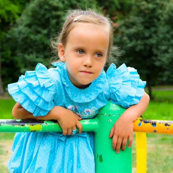 Menina no parque infantil — Fotografia de Stock