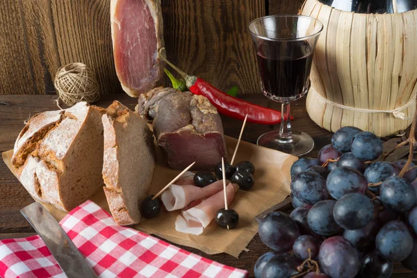 Ham, wine and bread — Stock Photo, Image