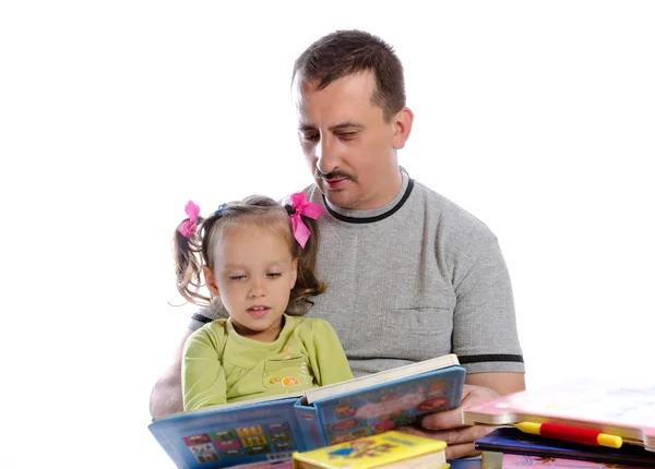 Padre con figlia in lettura — Foto Stock