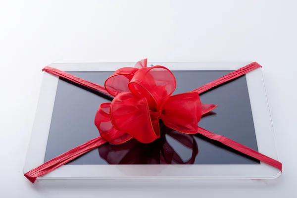 Tablet PC with ribbon — Stock Photo, Image