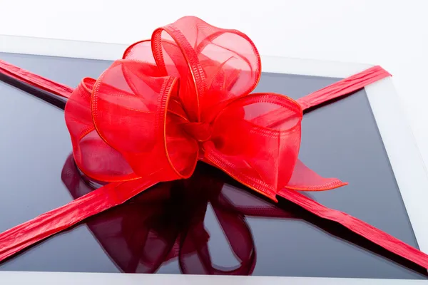 Tablet PC with ribbon — Stock Photo, Image