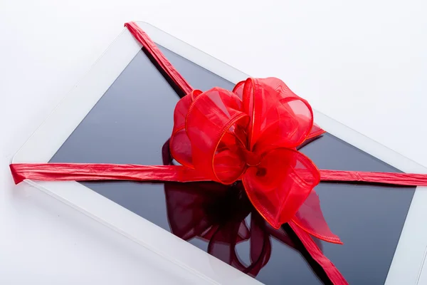 Tablet PC with ribbon — Stock Photo, Image