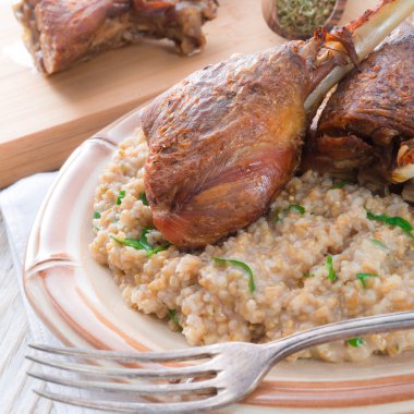 roasted goose thighs with grits