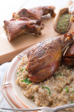roasted goose thighs with grits